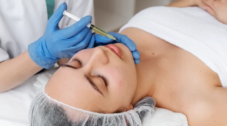 high-angle-woman-getting-face-prp-treatment