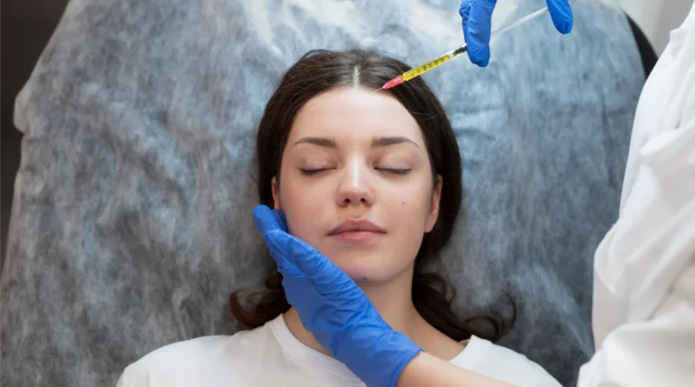 smiley-young-woman-getting-prp-injection (1)